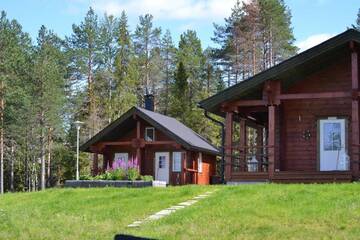 Фото номера Шале с 3 спальнями Кемпинги Kenttäniemi Cottages г. Сонка 57