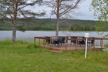 Фото номера Шале с 3 спальнями Кемпинги Kenttäniemi Cottages г. Сонка 30