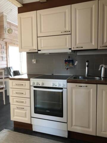 Фото номера Шале с 3 спальнями Кемпинги Kenttäniemi Cottages г. Сонка 45