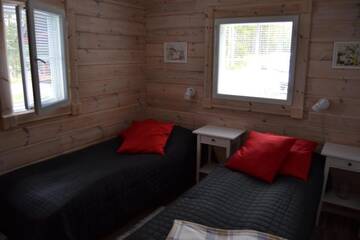 Фото номера Шале с 3 спальнями Кемпинги Kenttäniemi Cottages г. Сонка 46