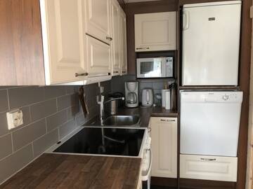 Фото номера Шале с 3 спальнями Кемпинги Kenttäniemi Cottages г. Сонка 11