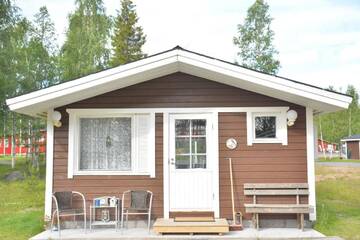Фото номера Bungalow with Patio - Mustikka Дома для отпуска Palojärven Lomakeskus г. Сонка 4