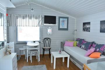 Фото номера Bungalow with Patio - Puolukka Дома для отпуска Palojärven Lomakeskus г. Сонка 5